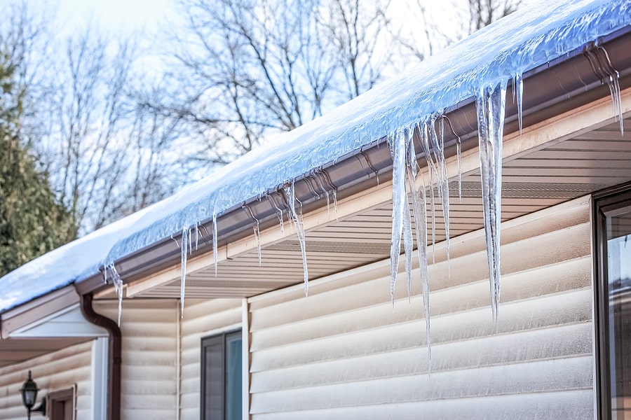 Ice dam roof gutters